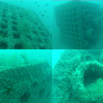 Collage d'esculls artificials al Port Olímpic